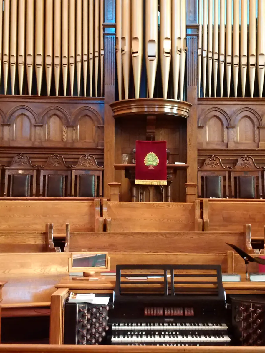 The 1909 Casavant organ pipes above the pulpit and choir loft